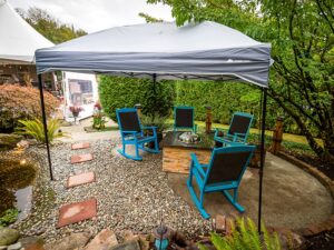 Rocking chair, fire pit, and event tent rental
